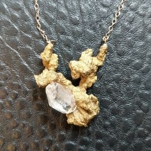 Crystal and brass pendant necklace